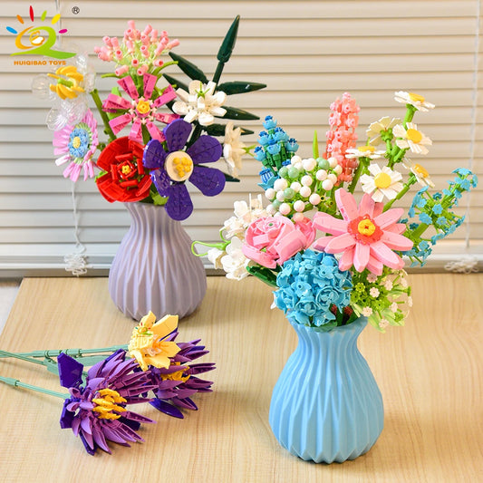 Bouquets de fleurs avec vases